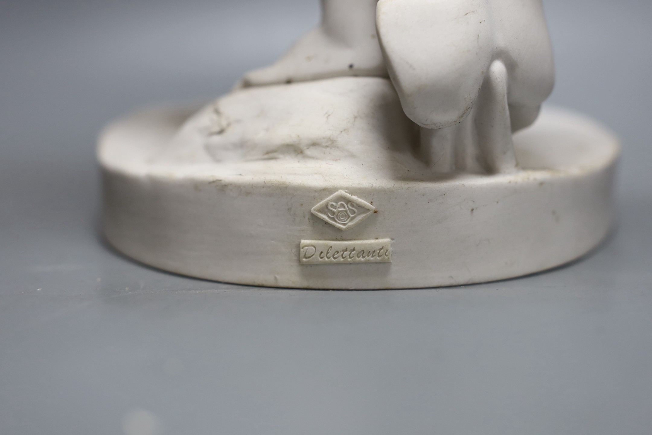 A modern resin marble figure, 'The Stepping Stones', by Dilettanti, coin inset to base, 49cm